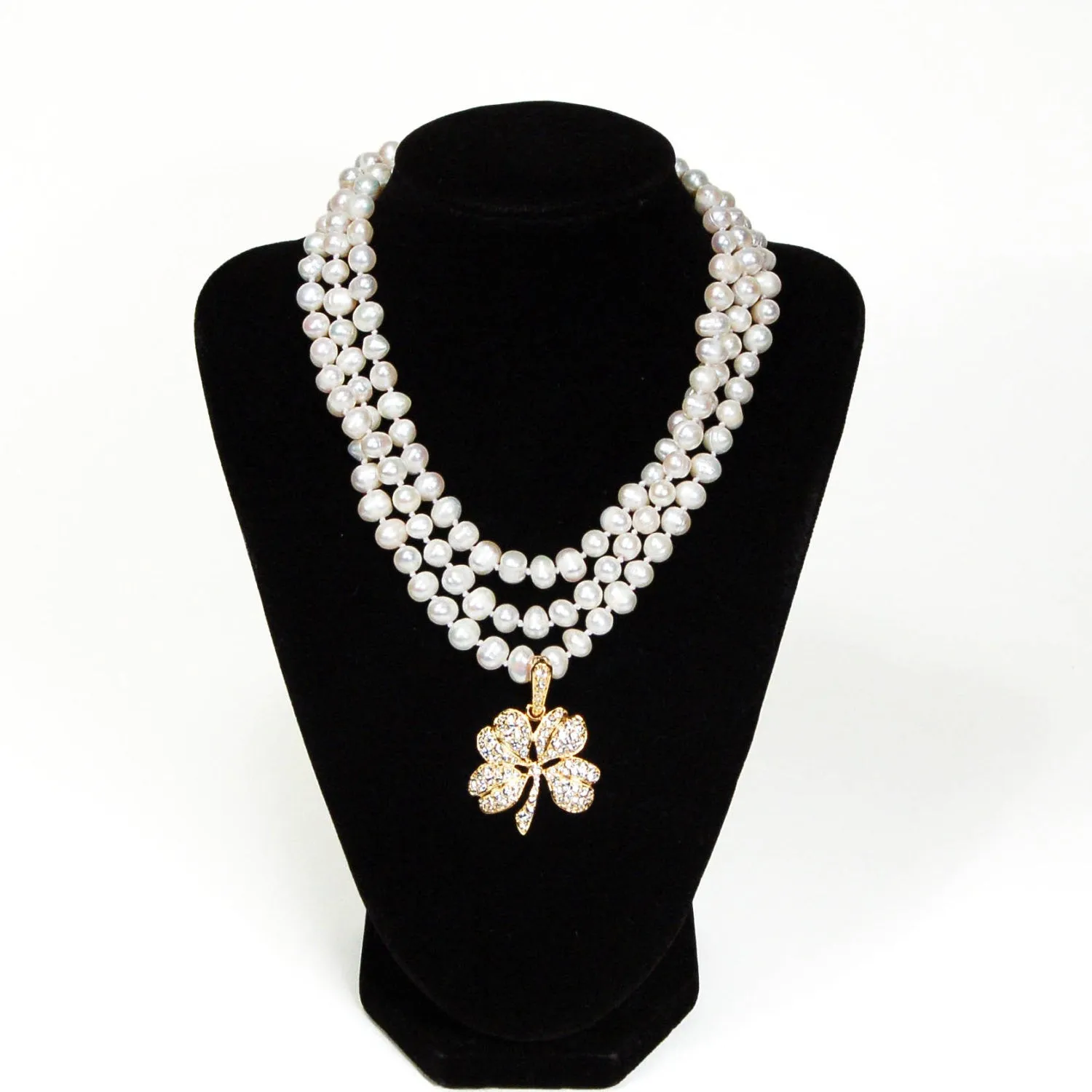 Gold Tone Rhinestone Shamrock Pendant by KJL