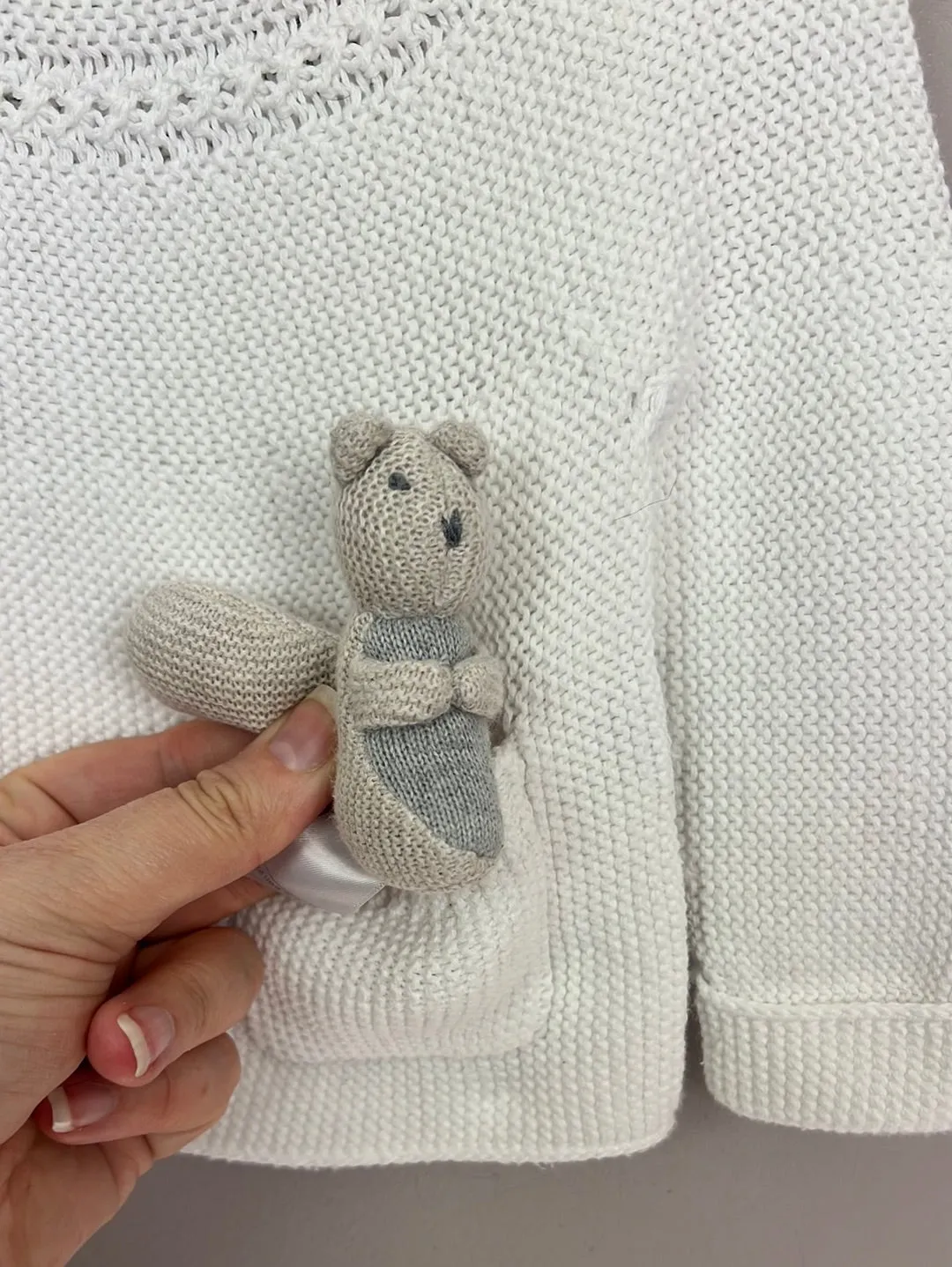 Little White Company white jumper with toy squirrel 0-3m