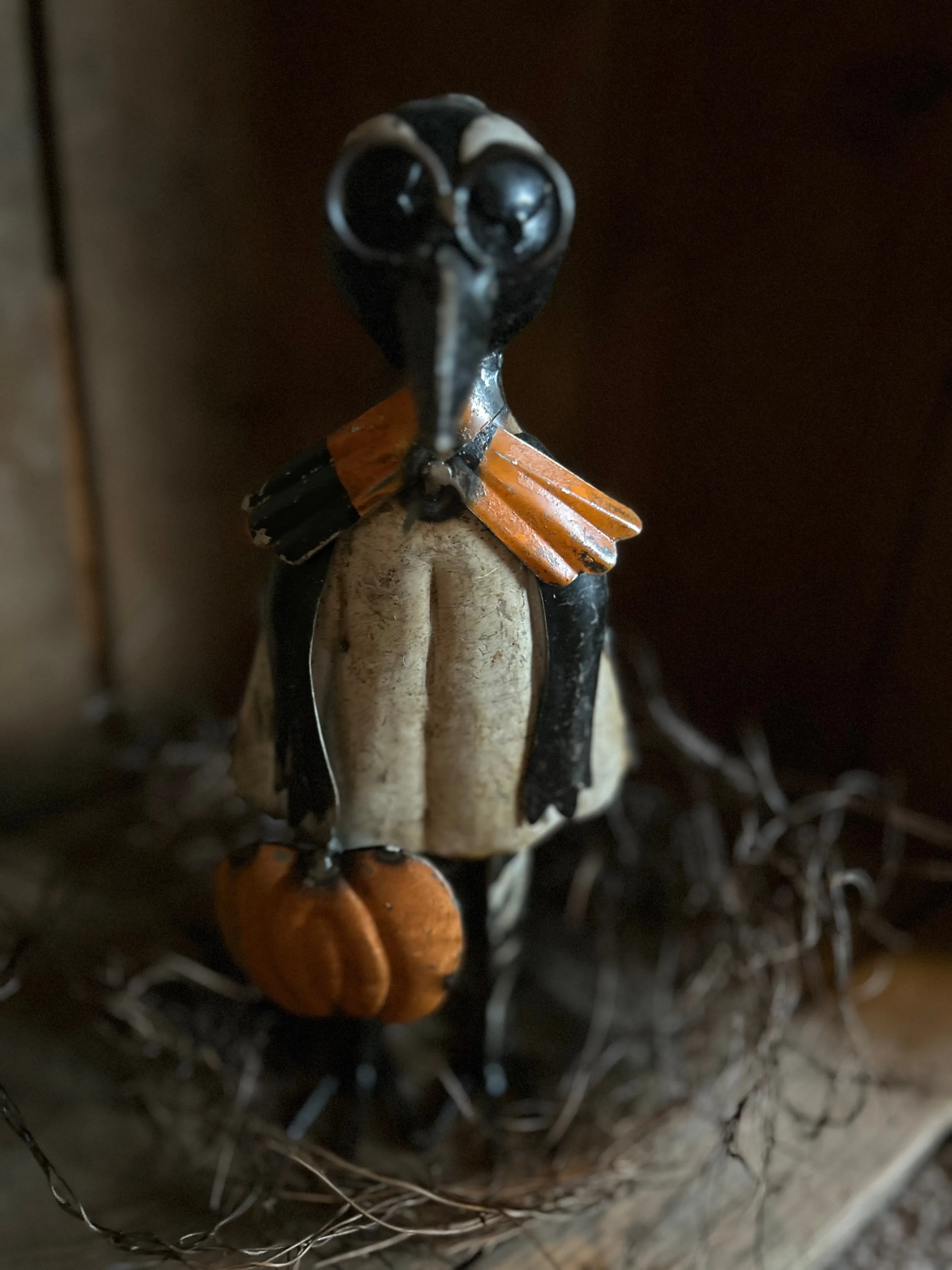 Metal Crow Holding Pumpkin