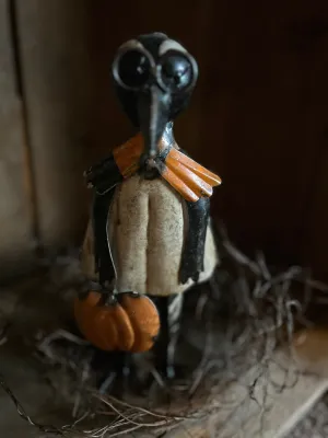 Metal Crow Holding Pumpkin